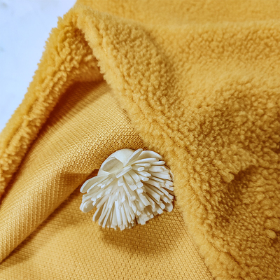 Sherpa hecho punto deformación esquilar el telar jacquar amarillo 100% del poliéster de la tela para la ropa