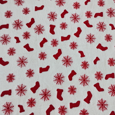 La tela de la franela del poliéster de la deformación cubrió con la hoja roja 270GSM para la ropa de la Navidad