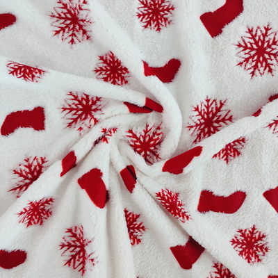 La tela de la franela del poliéster de la deformación cubrió con la hoja roja 270GSM para la ropa de la Navidad