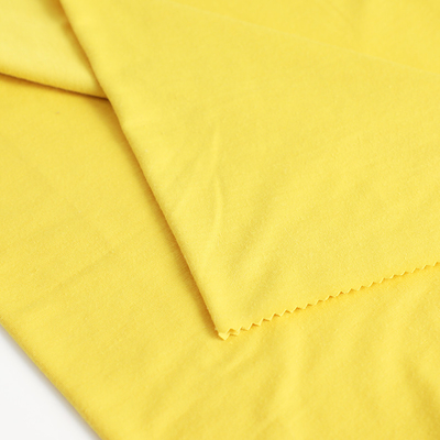 El algodón hizo punto la sola tela 100gsm del jersey para la camisa empaqueta la alineación