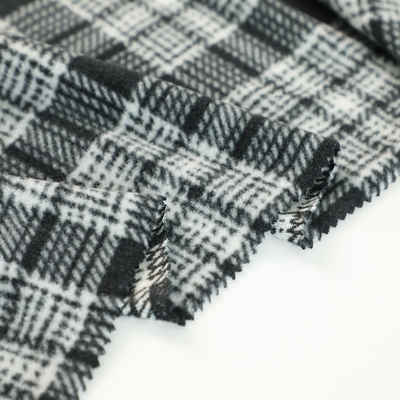 La tela escocesa micro catiónica 100% de la tela del paño grueso y suave del poliéster imprimió polar para Sofa Pillowslip Blankets